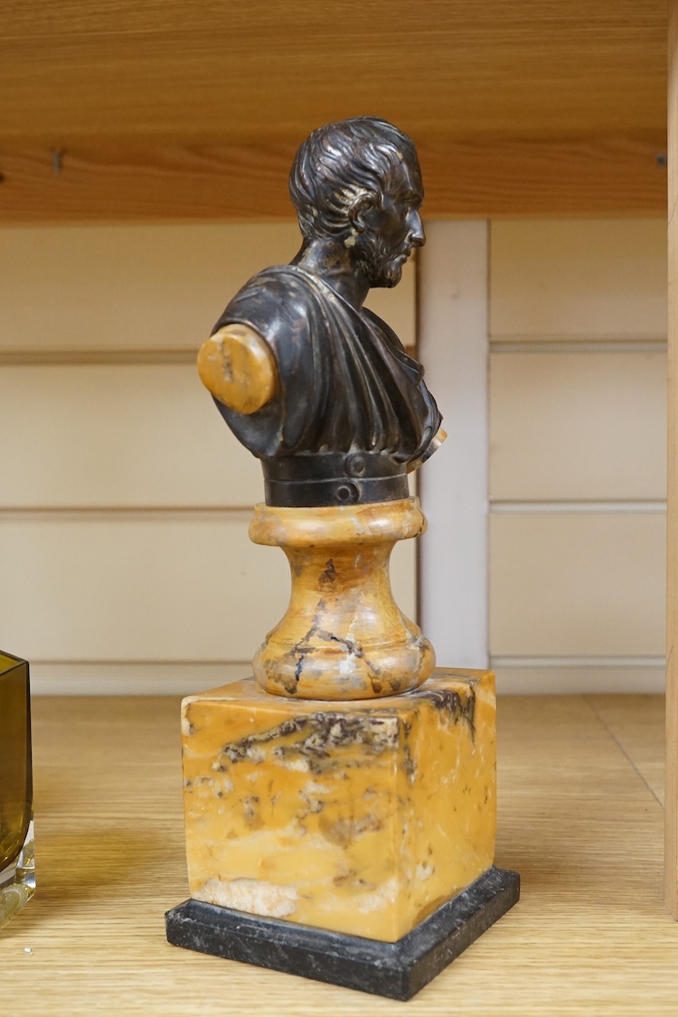 A bronze bust of a philosopher raised on square marble base, 27cm high